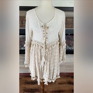 NJ couture cream cotton swing top. Size S/M